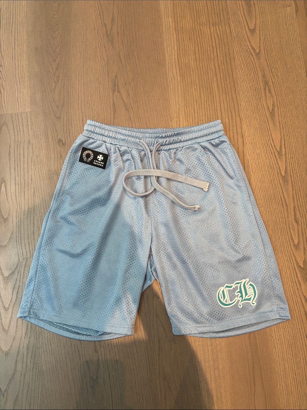 Chrome Hearts Light Blue Mesh Athletic Shorts with CH Emblem